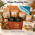 Fork My World Home Warming Box with wave serving board, two black gold-logo mugs, coffee and mushroom spread items.